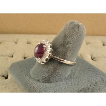 VINTAGE SIGNED LINDE LINDY CLARET RED STAR SAPPHIRE CREATED HALO RING RD PL S/S